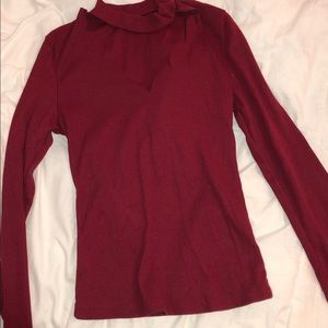 red long sleeve top